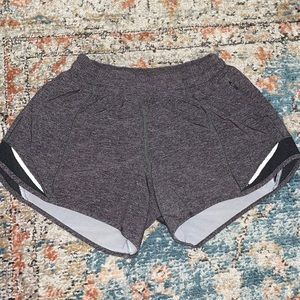 Lululemon pair of heather grey Hotty Hot shorts. Size 4 Tall